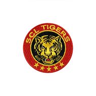 SCL Tigers Stick Badge 5cm 